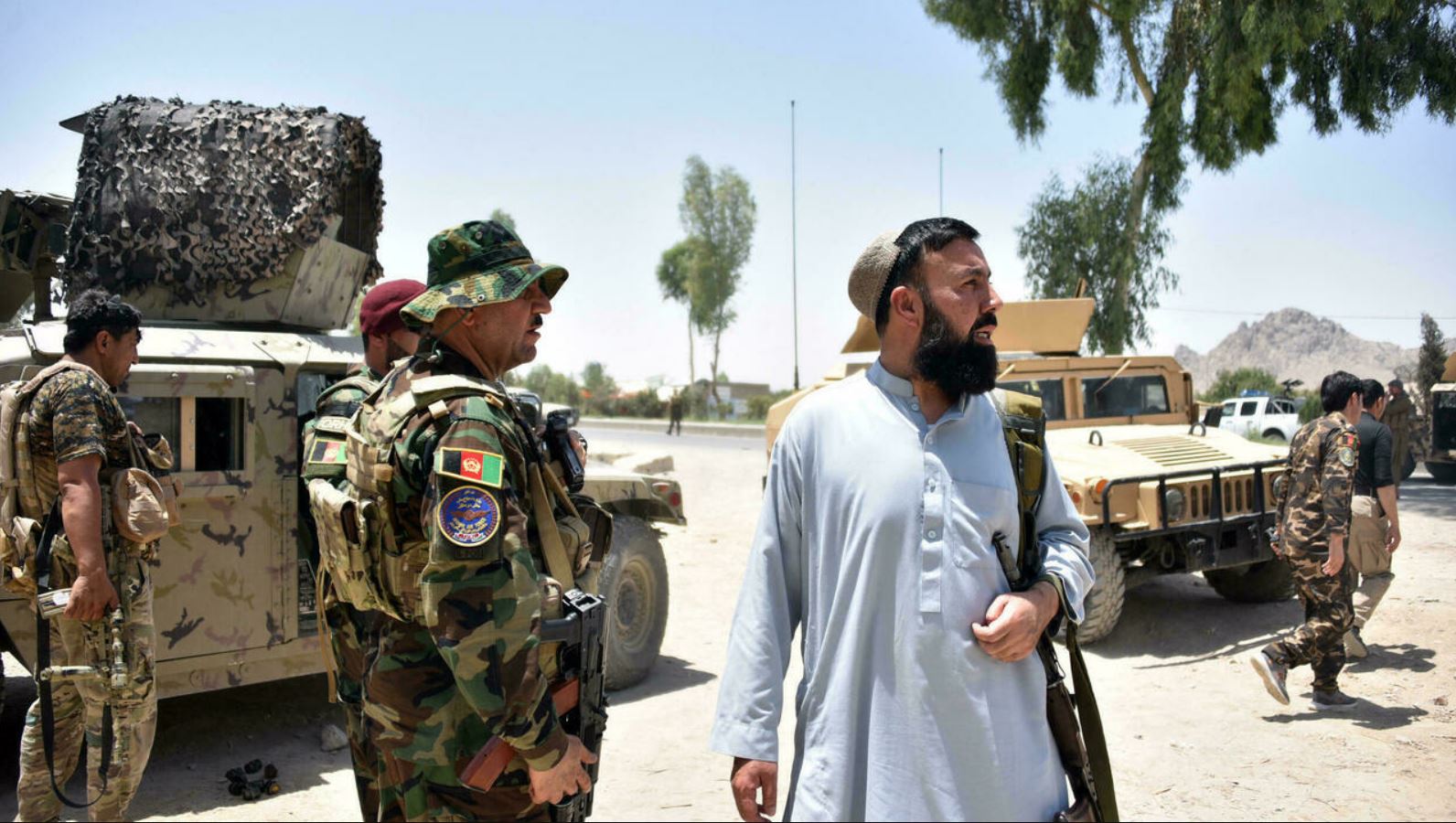 Fighting rages in Afghanistan as US, UK accuse Taliban of massacring civilians in border district