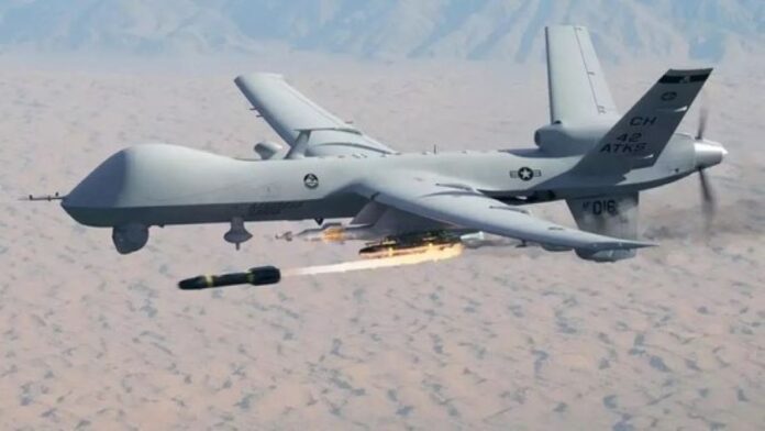 US Predator drone firing Hellfire missile.